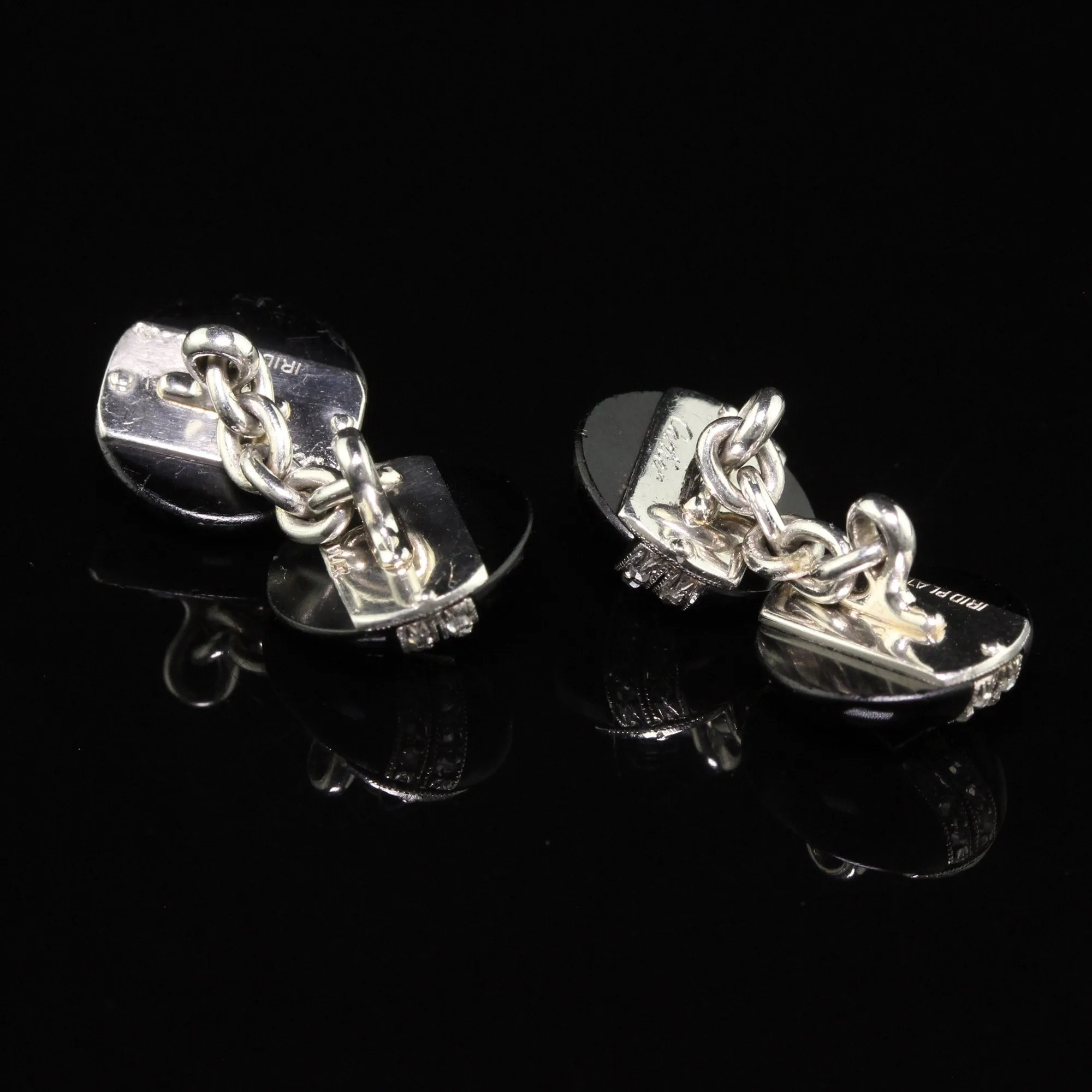Antique Art Deco Cartier Platinum Diamond Emerald and Onyx Cufflinks