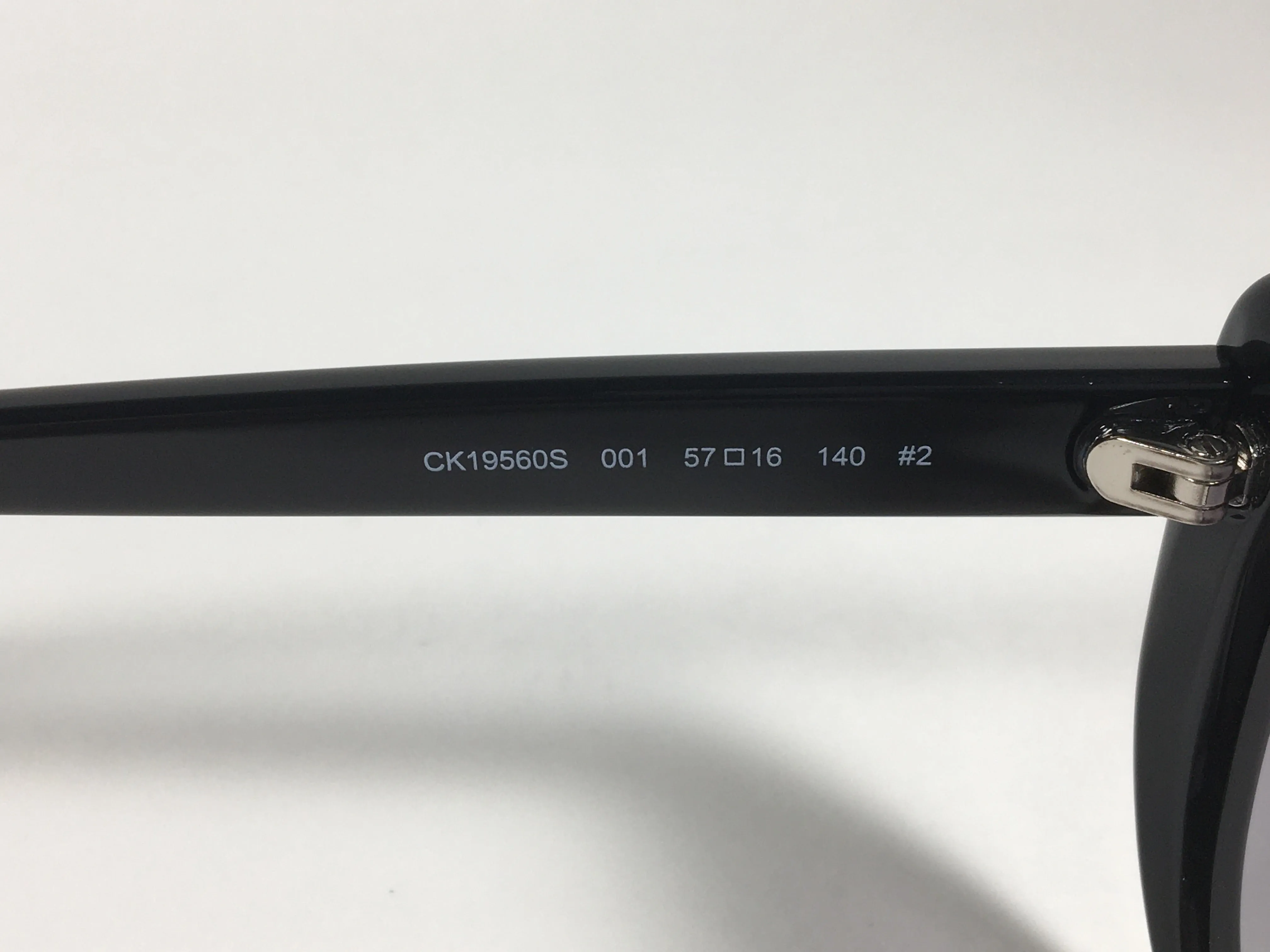 Calvin Klein Cat Eye Sunglasses CK19560S 001 Black Gloss Frame Gray Gradient Lens