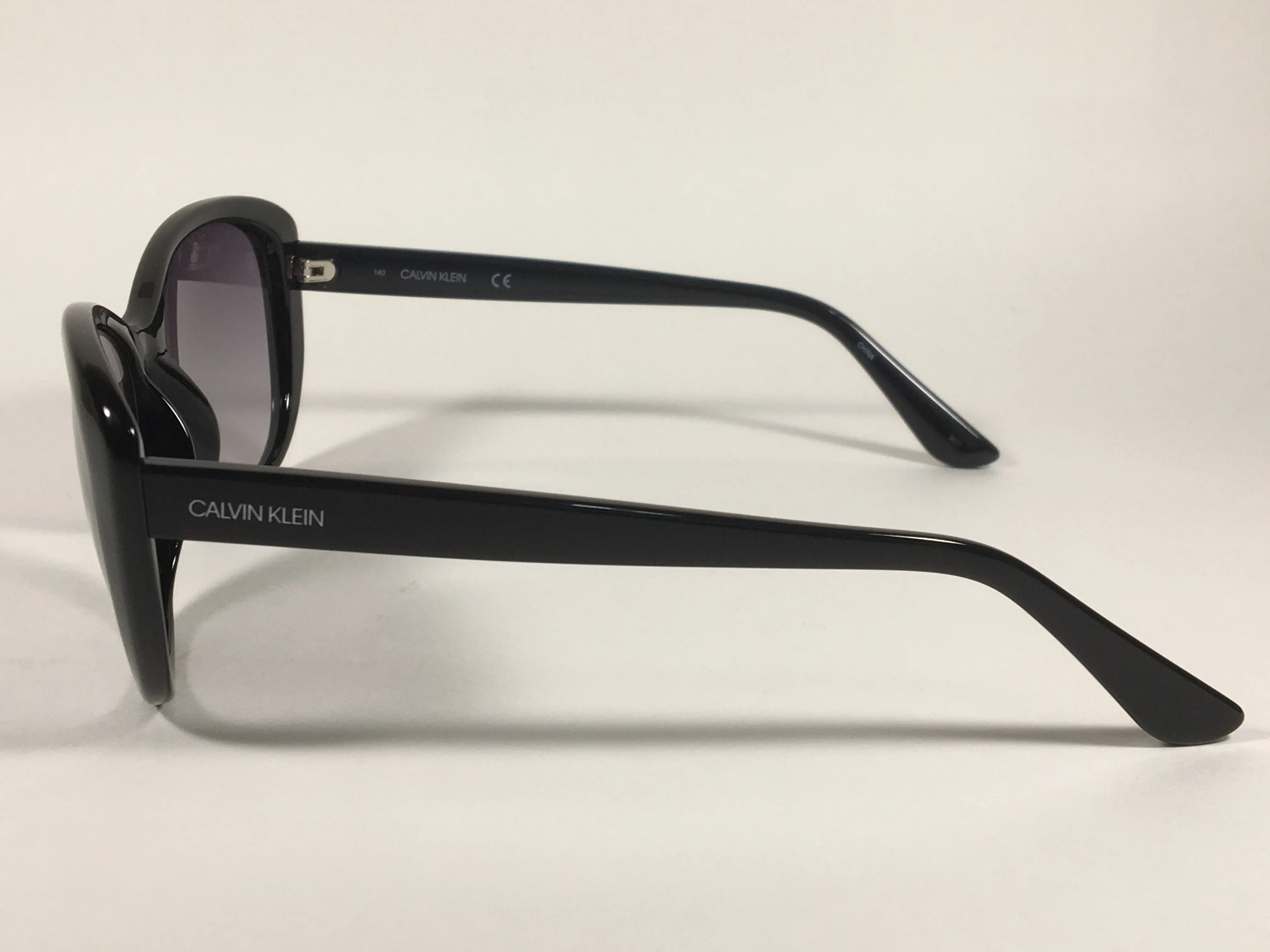 Calvin Klein Cat Eye Sunglasses CK19560S 001 Black Gloss Frame Gray Gradient Lens