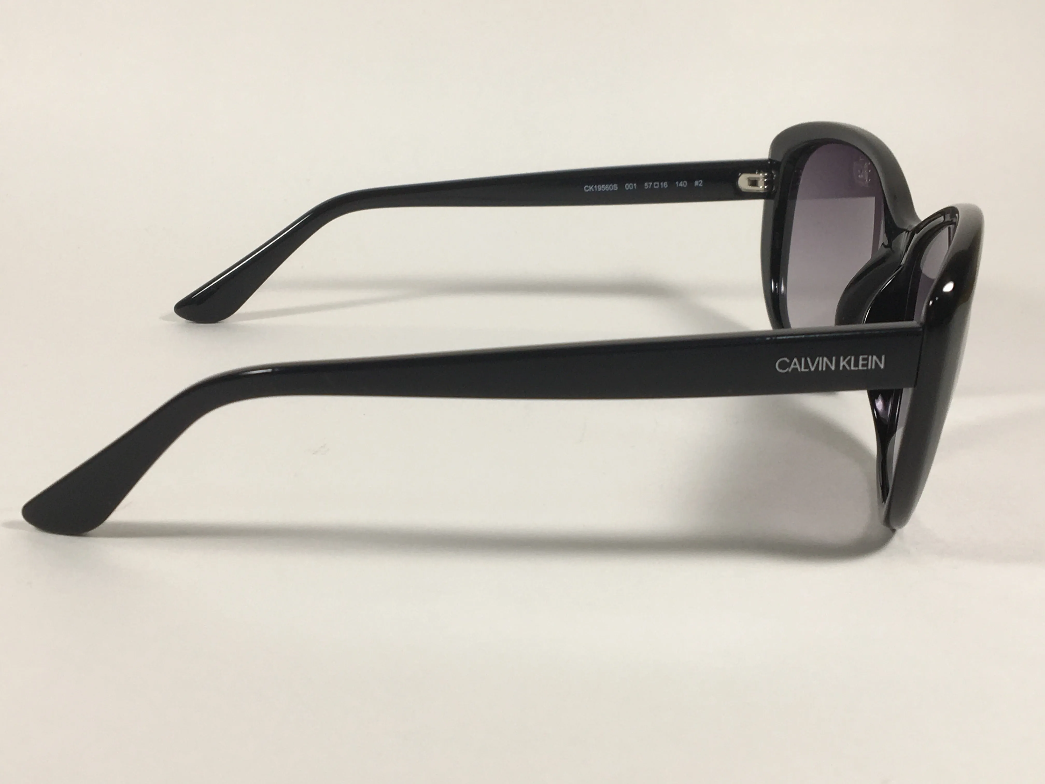 Calvin Klein Cat Eye Sunglasses CK19560S 001 Black Gloss Frame Gray Gradient Lens