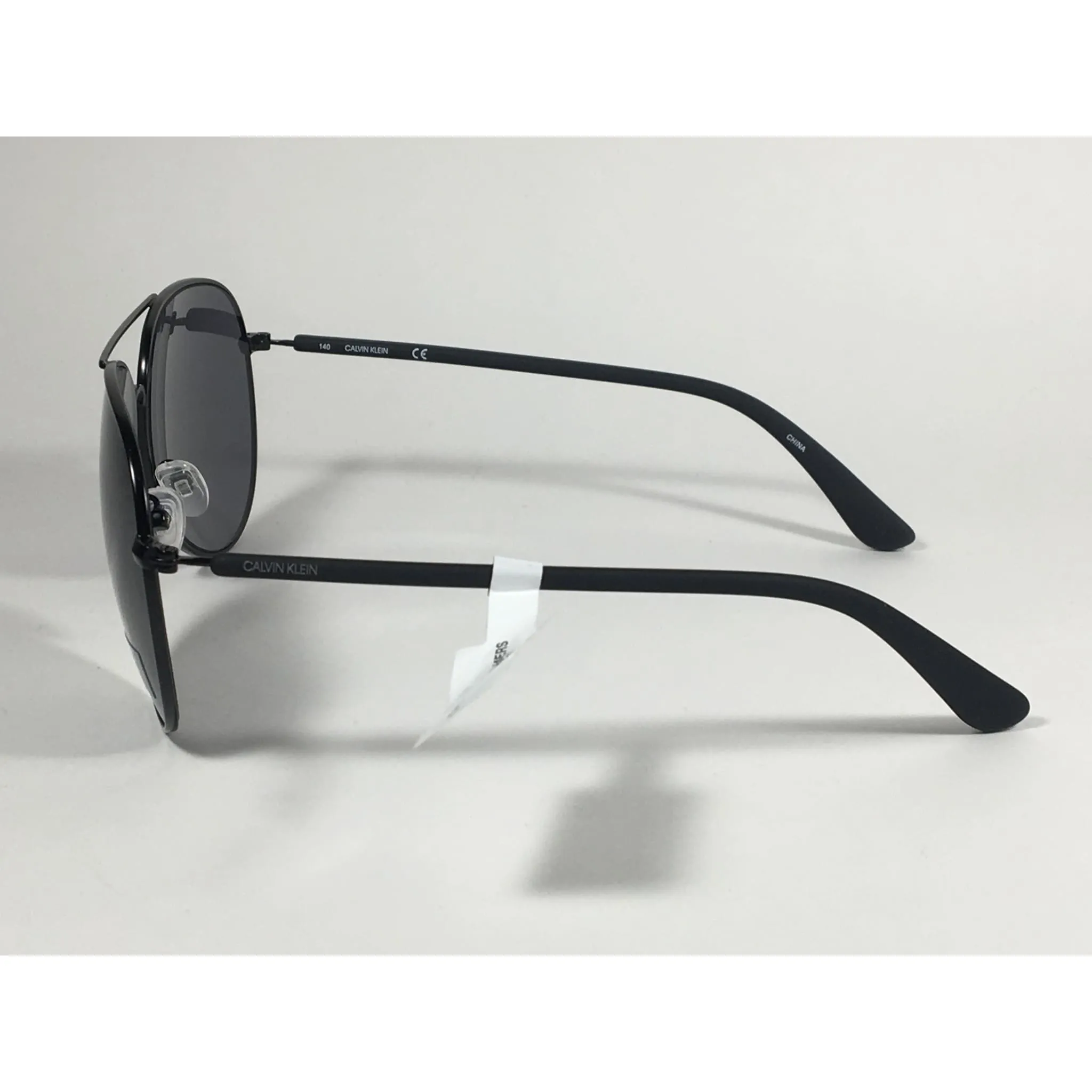 Calvin Klein CK19314S 001 Aviator Pilot Sunglasses Matte Black Metal and Plastic Frame Gray Lens