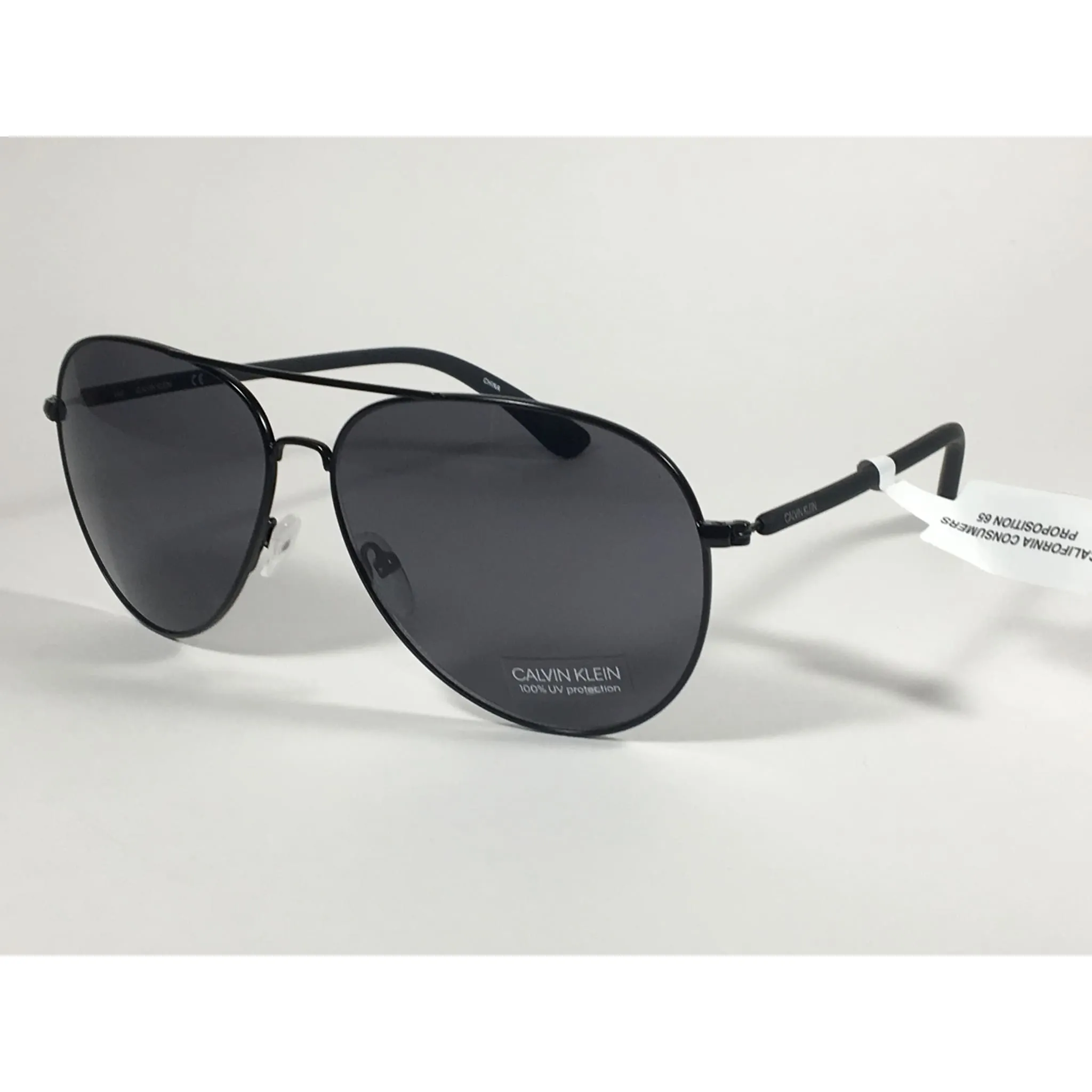 Calvin Klein CK19314S 001 Aviator Pilot Sunglasses Matte Black Metal and Plastic Frame Gray Lens