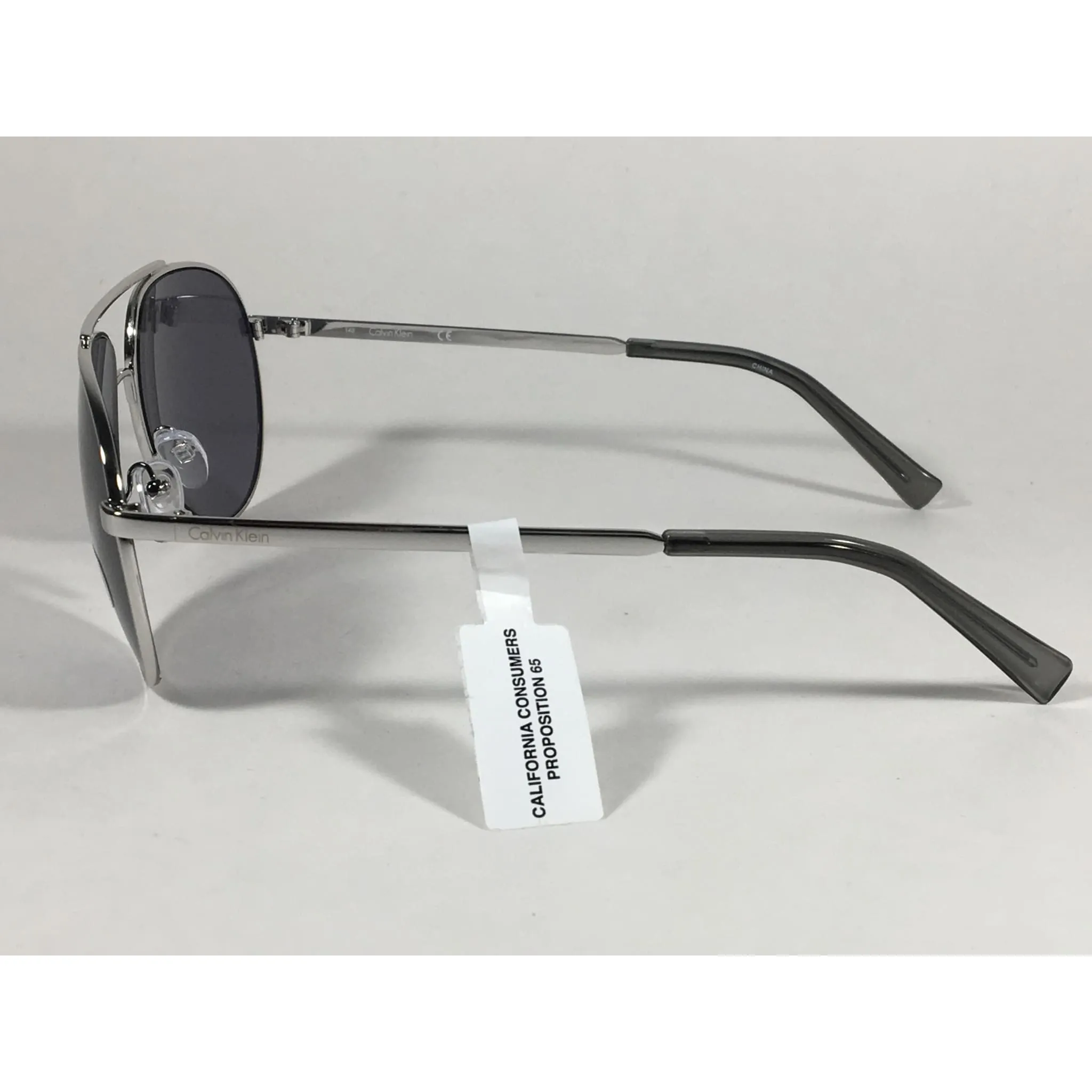Calvin Klein R167S 045 Aviator Pilot Sunglasses Silver Metal Frame And Gray Lens