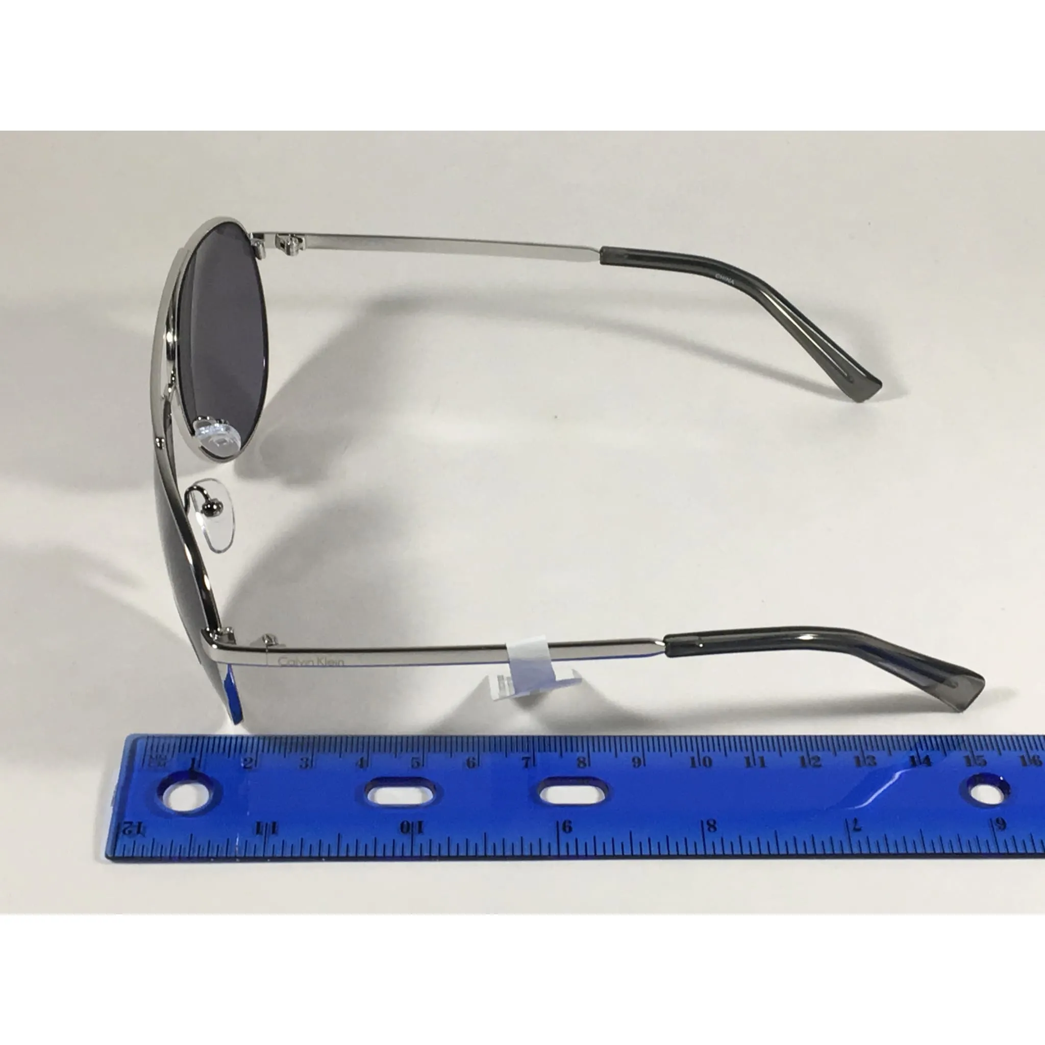 Calvin Klein R167S 045 Aviator Pilot Sunglasses Silver Metal Frame And Gray Lens