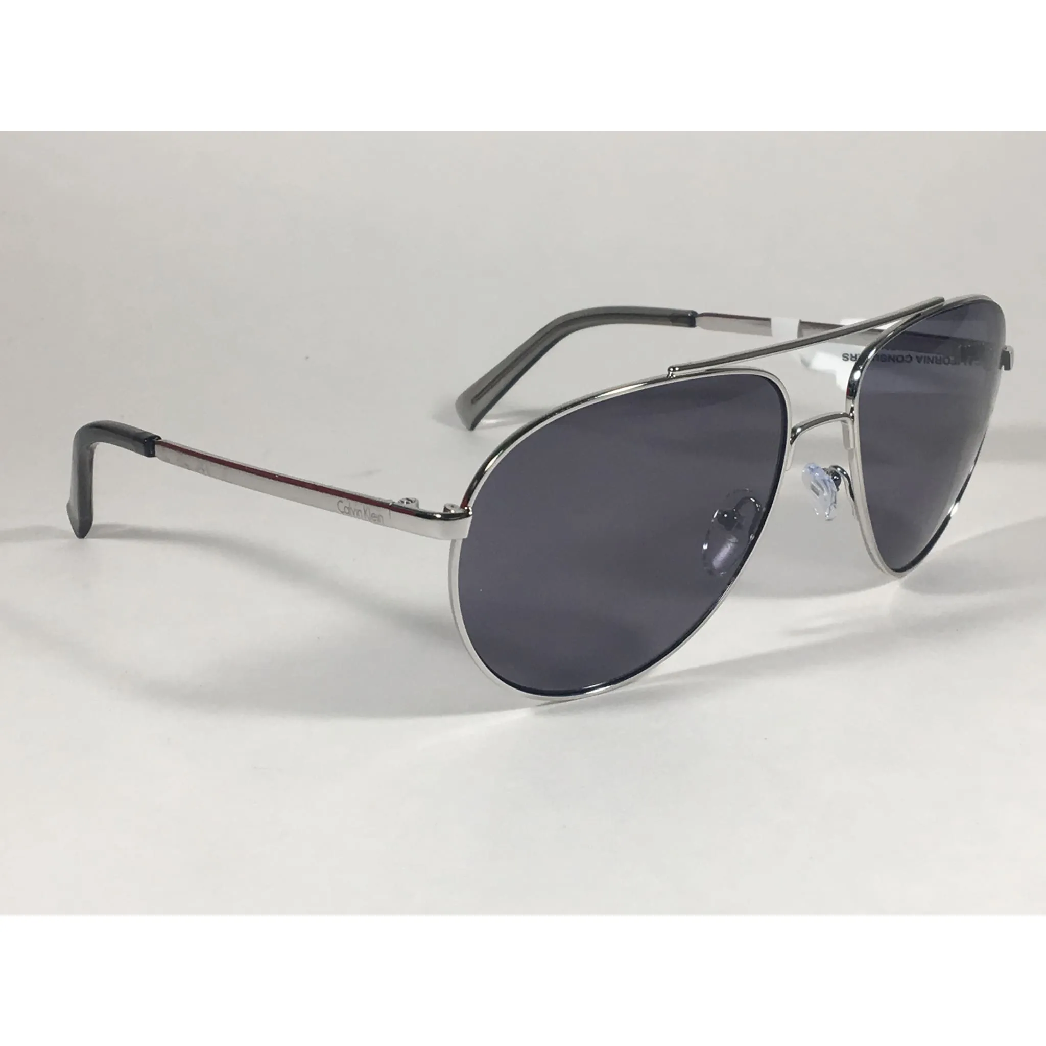 Calvin Klein R167S 045 Aviator Pilot Sunglasses Silver Metal Frame And Gray Lens