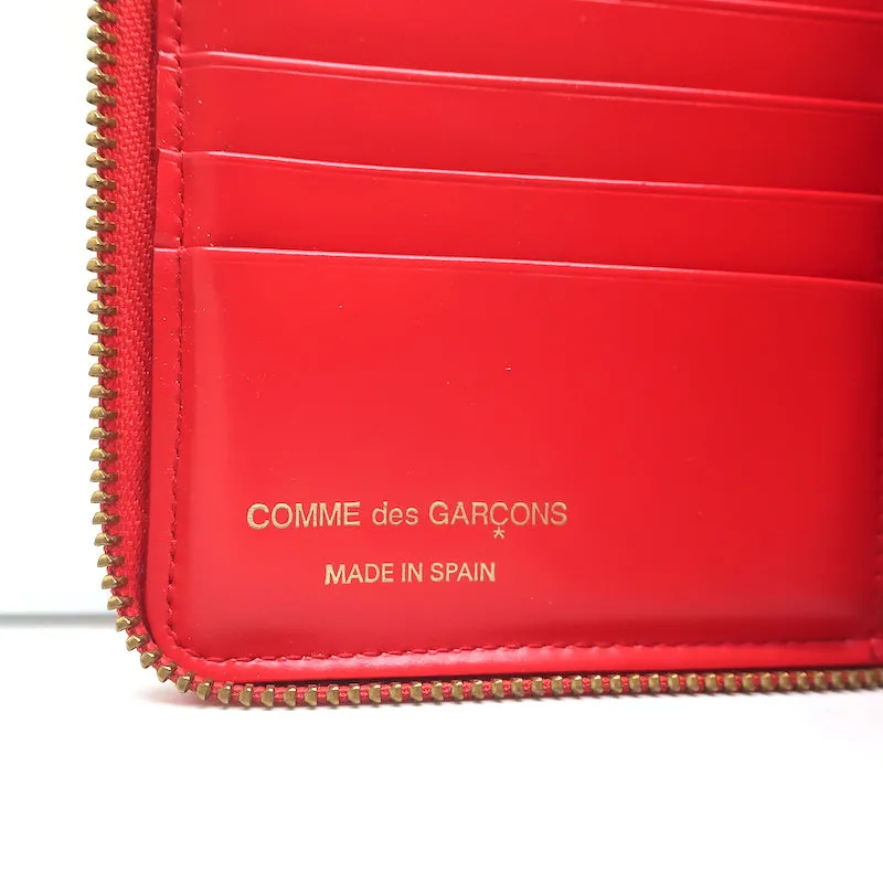 Comme des Garcons Raised Spike Zip Around Wallet Red Glossy Leather