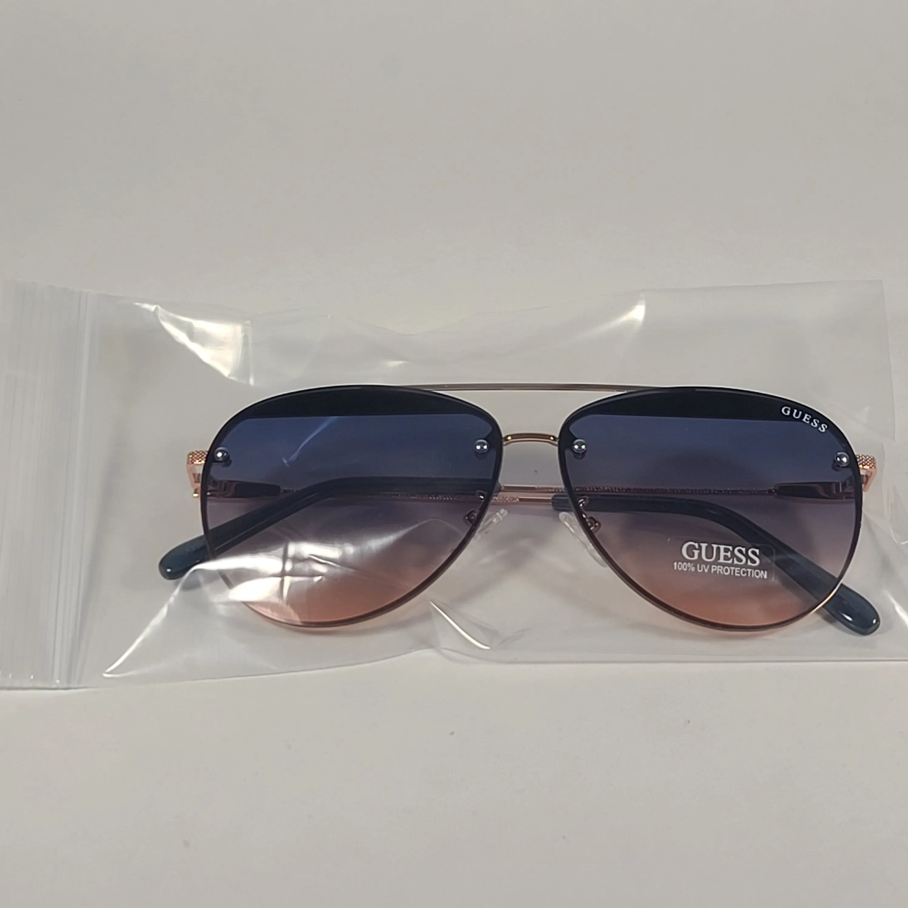 Guess Rimless Aviator Sunglasses Rose Gold Metal Frame Blue Gradient Lens GF0386 28W