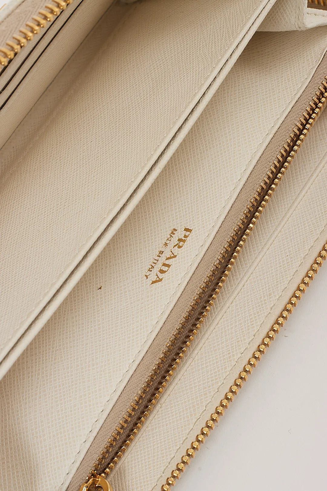 Prada Off White Saffiano Leather Zippy Wallet